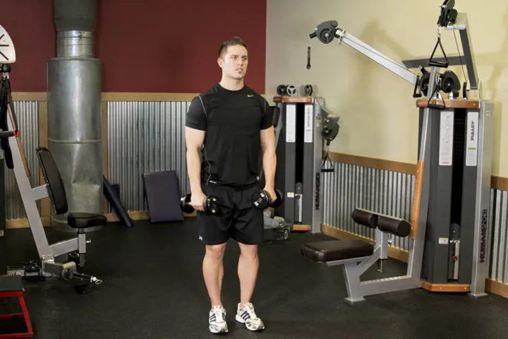 Alternating Deltoid Raise — posição inicial