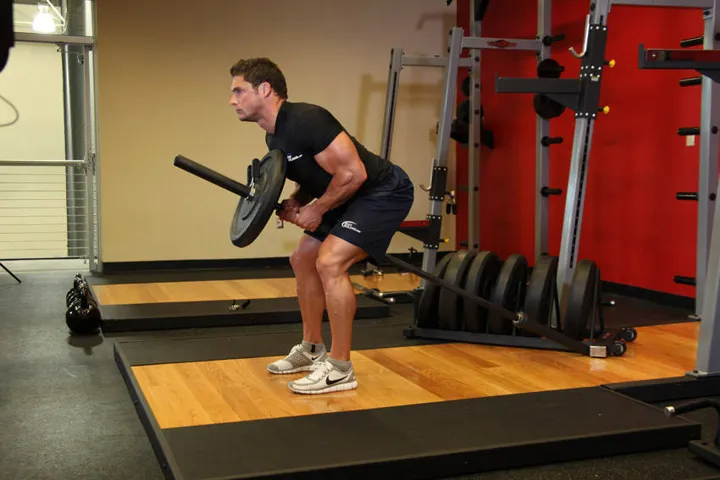 Bent Over Two-Arm Long Bar Row — contração