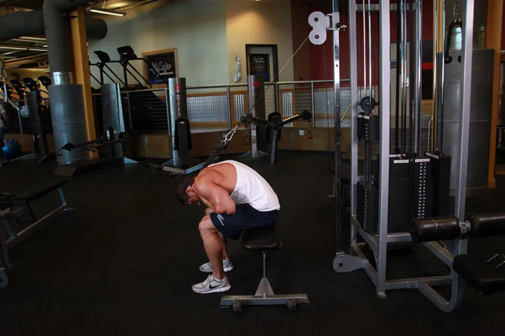 Cable Seated Crunch — contração