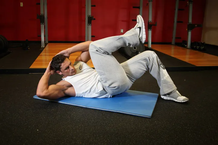 Cross-Body Crunch — contração