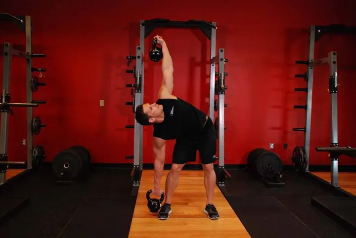 Double Kettlebell Windmill — contração