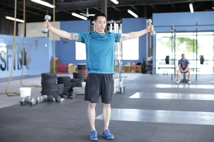 Dumbbell Scaption — contração