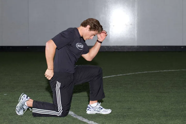 Kneeling Arm Drill — contração