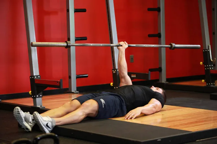 One Arm Floor Press — contração