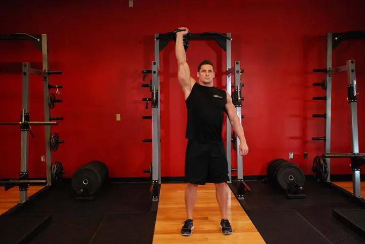 One-Arm Kettlebell Para Press — contração