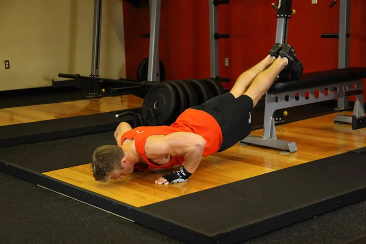 Push-Ups With Feet Elevated — contração