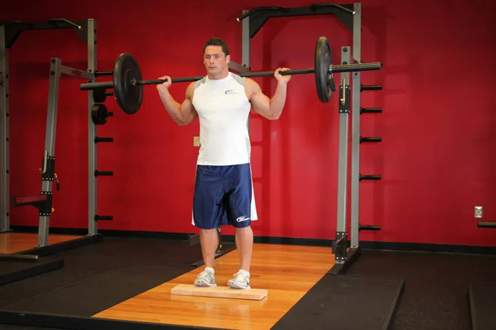 Standing Barbell Calf Raise — contração