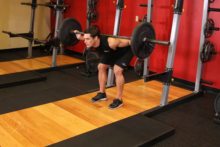 Stiff Leg Barbell Good Morning — contração