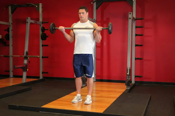 Wide-Grip Standing Barbell Curl — contração