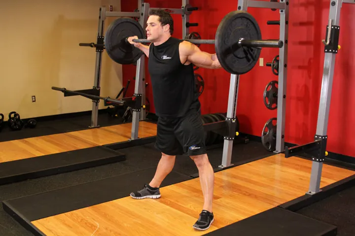 Wide Stance Barbell Squat — posição inicial